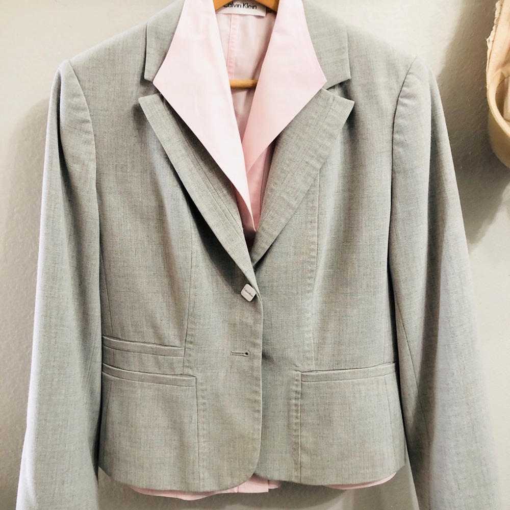 Calvin Klein pale gray suit with pink blouse